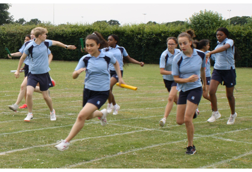 CCHSG students in the school PE Kit compete in a relay race