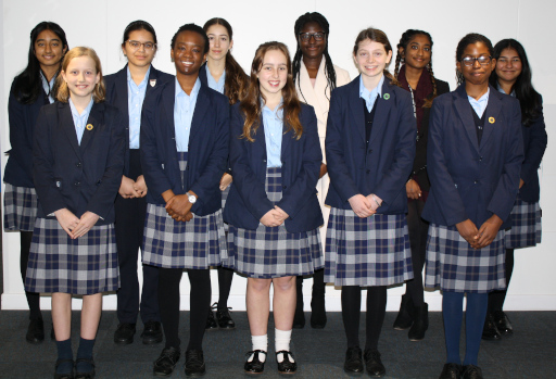 A group of students stand smartly in their blue CCHSG Uniforms