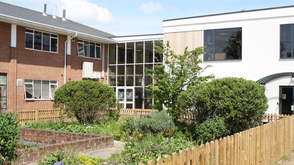 A sunny view of the recently built Sixth Form Atrium and Art block